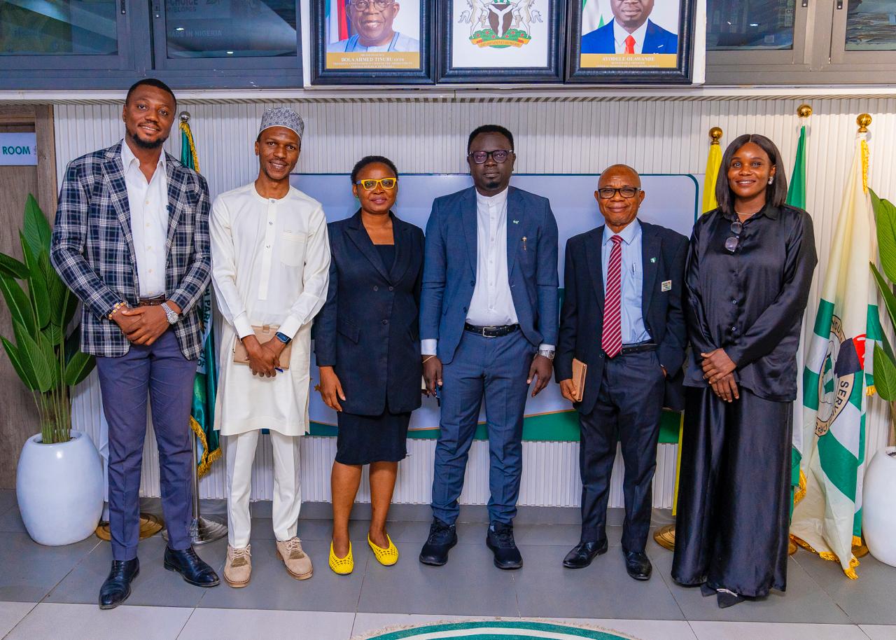 Group photograph at the MoU signing between APDC Group and the Federal Ministry of Youth Development. From left to right: Patrick Tawo (Snr. Manager, Knowledge Management and ICT, Maaruf Yakub (Director of Programmes, Policy and Partnerships), Amina Yunusa (Strategy, Legal and Operations Officer), Honourable Minister Comrade Ayodele Olawande (FMYD), Dr Chiji Ojukwu (MD, APDC Group) and Favour Abiola (Business Development Manager)